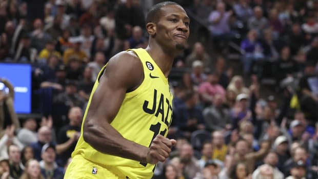 Utah Jazz guard Kris Dunn (11) reacts to a dunk against the San Antonio Spurs in the second half at Vivint Arena.